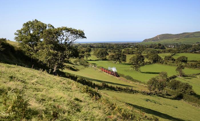 The train leaves the Irish Sea behind and starts the journey up the Fathew valley.  Pic Lewis Maddox